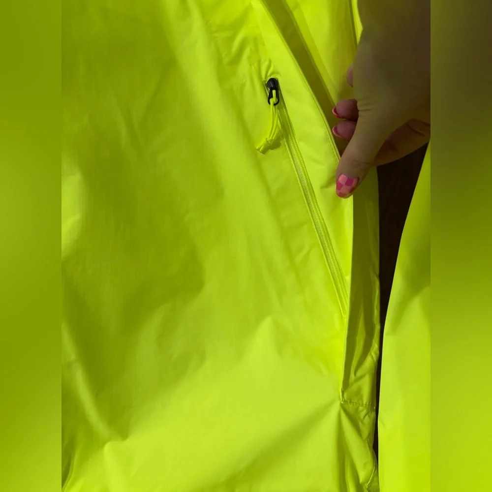 The North Face Neon Yellow and Black Windbreaker Coat